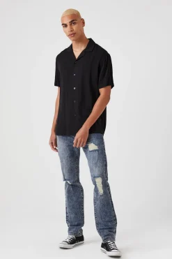 Distressed Slim-Leg Jeans