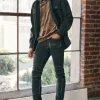 Distressed Zippered Skinny Jeans