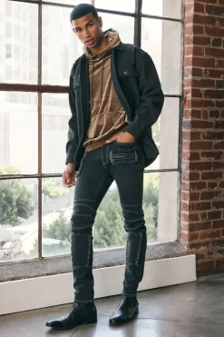 Distressed Zippered Skinny Jeans