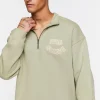Flocked Still Going Graphic Half-Zip Pullover